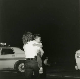 Woman Holding a Child