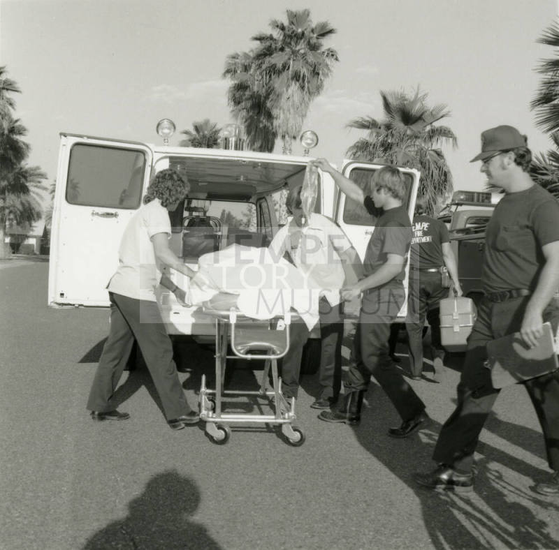 Putting Patient Into Ambulance