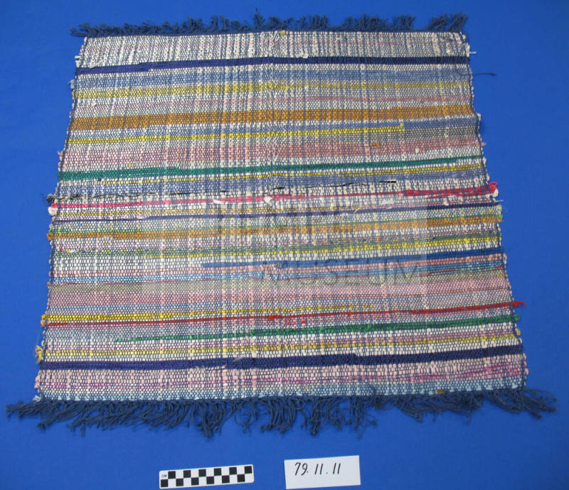 Hand woven throw rug