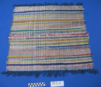 Hand woven throw rug