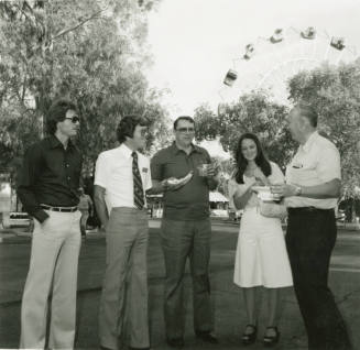 Men and Woman in Legend City amusement park