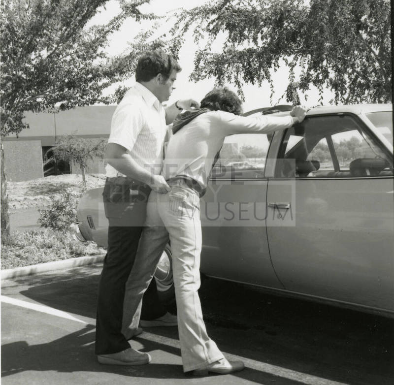 Police Officer Holds Man 2