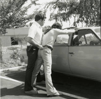Police Officer Holds Man 2