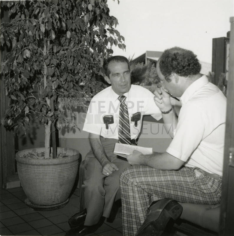 Unidentified Pair of Seated Men Conversing - (1 of 2)