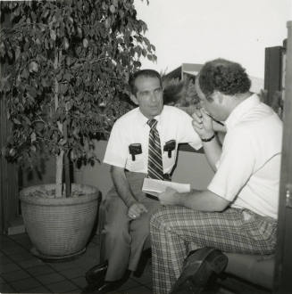 Unidentified Pair of Seated Men Conversing - (1 of 2)