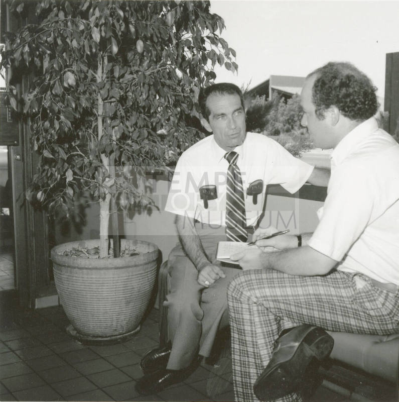 Unidentified Pair of Seated Men Conversing - (2 of 2)