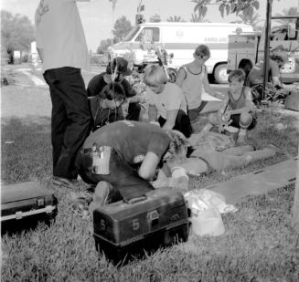 Unidentified Tempe Fire Personnel & Others Render Aid