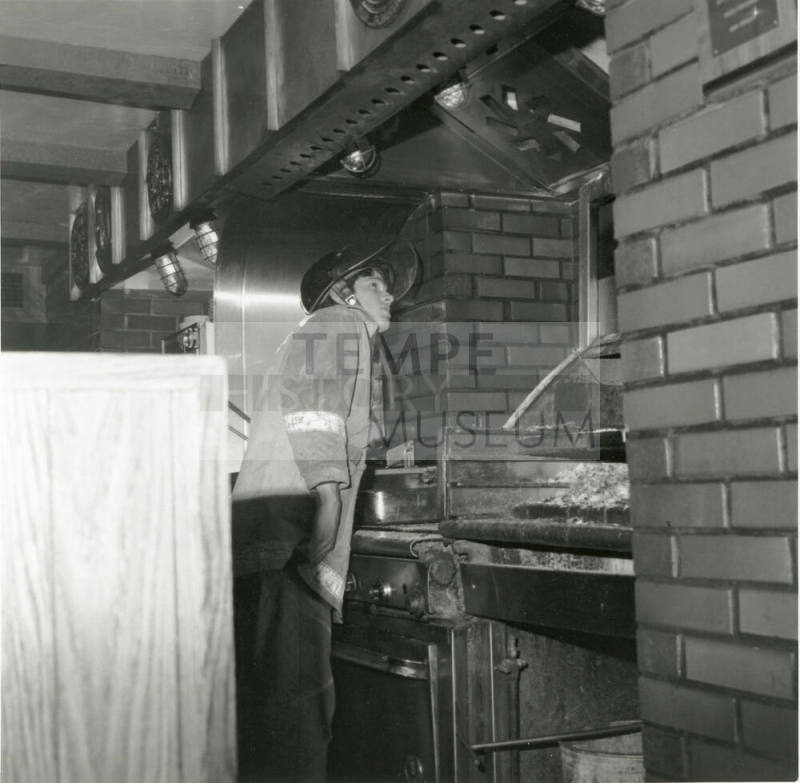 Fireman in restaurant -- August 1978