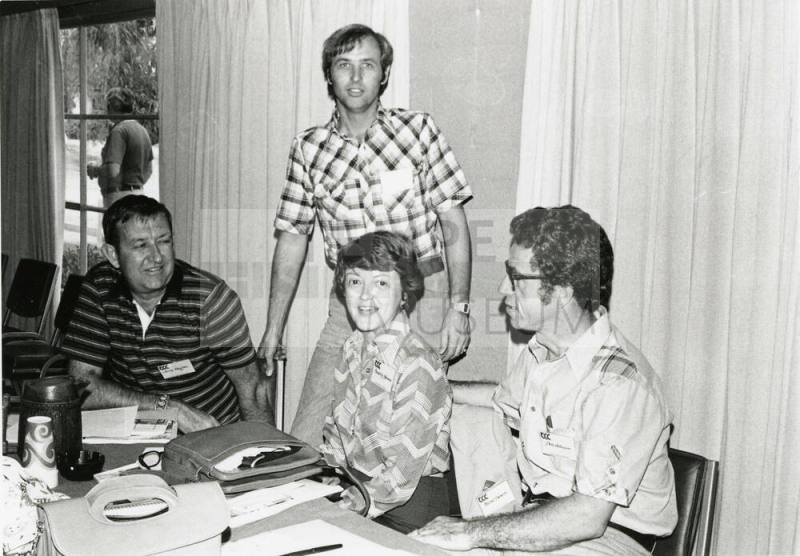 Four unidentified men.