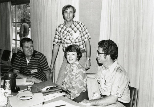 Four unidentified men.