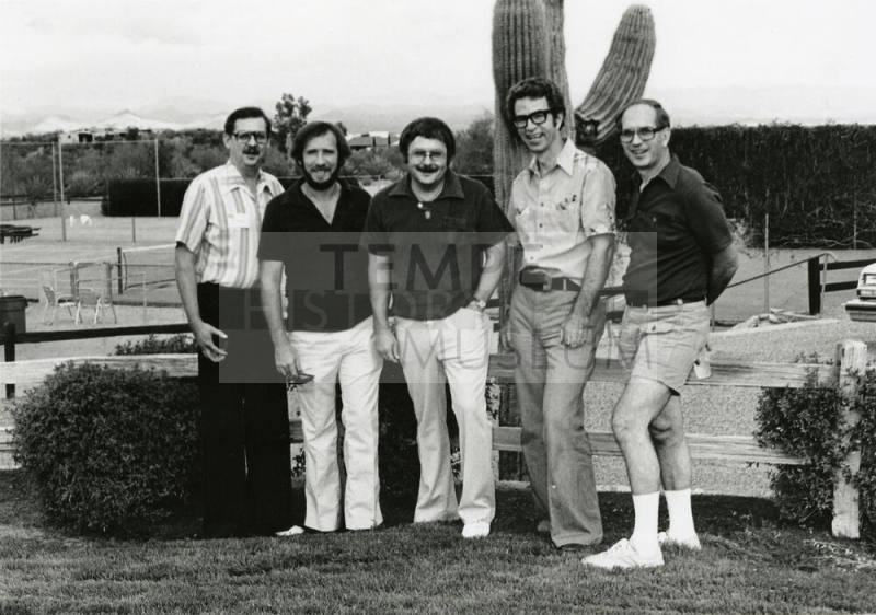 Five Unidentified Men Standing by a Cactus