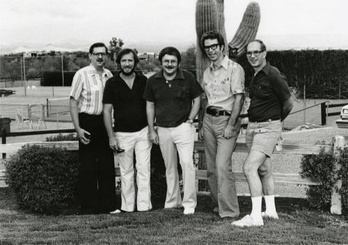 Five Unidentified Men Standing by a Cactus