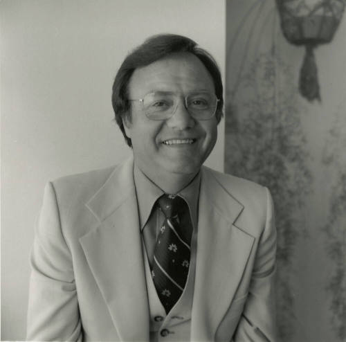 Unidentified Man With Glasses & White Suit - (1 of 2)