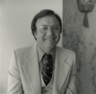Unidentified Man With Glasses & White Suit - (1 of 2)