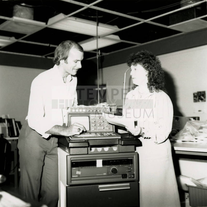 Unidentified Couple Discussing Electronic Device (EKG?)  - (2 of 2)