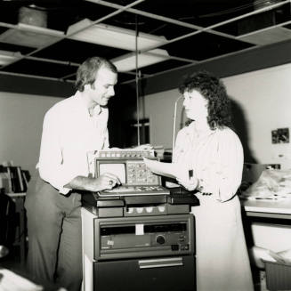 Unidentified Couple Discussing Electronic Device (EKG?)  - (2 of 2)