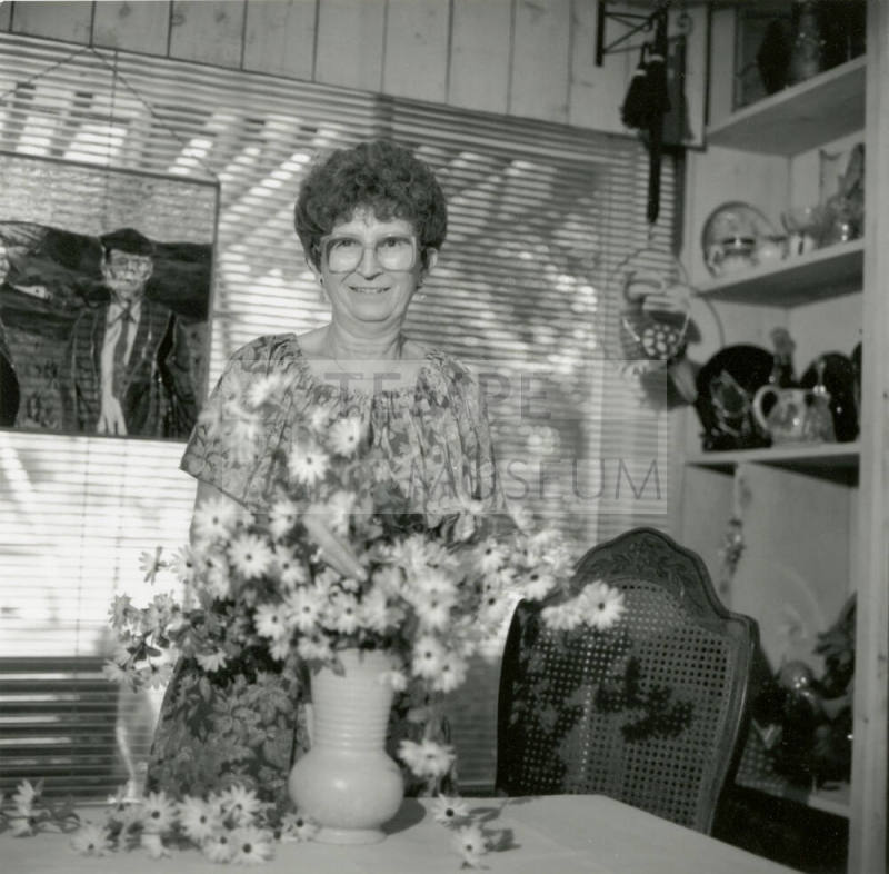 Woman Smiling with Flowers - September 1984