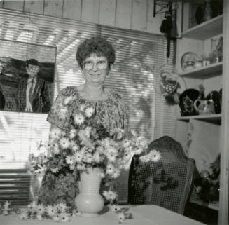 Woman Smiling with Flowers - September 1984