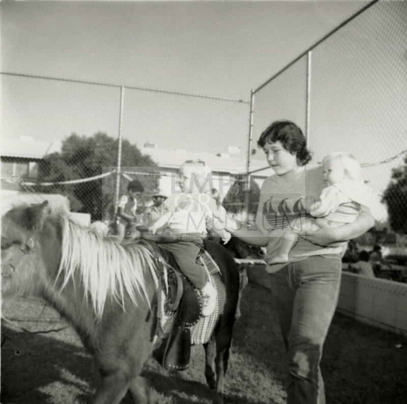 Unidentified Woman & 2 Children at Pony Ride