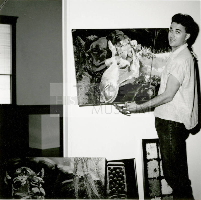 Unidentified Man Holding A Painting
