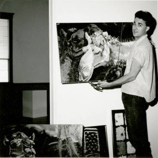 Unidentified Man Holding A Painting
