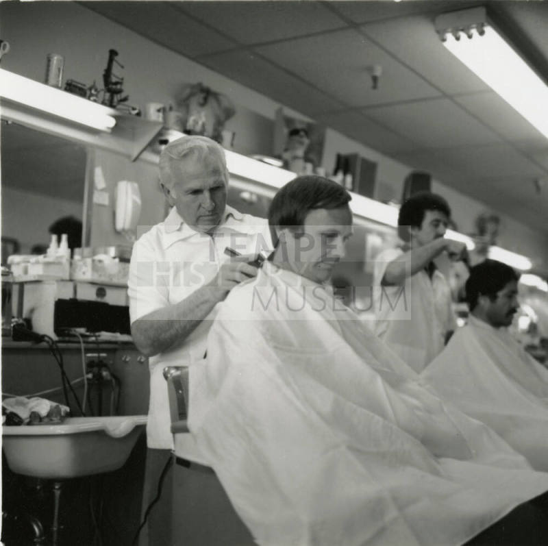 Mayor Mitchell gets haircut at Ray's Barber Shop
