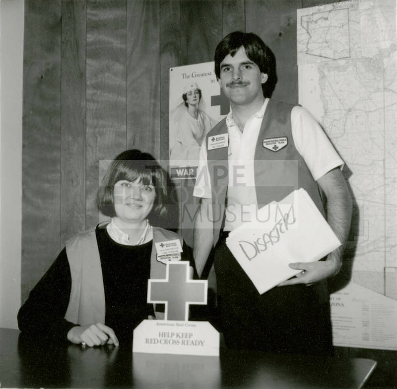 Couple spells relief 'R-E-D C-R-O-S-S'. - Tempe Daily News, December 24 1984