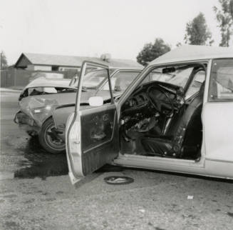 Convertible and Compact Car After Collision
