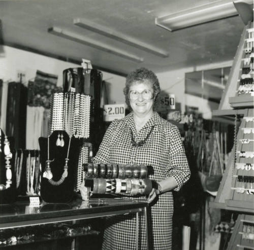 Woman at jewelry counter, January 21-27, 1985