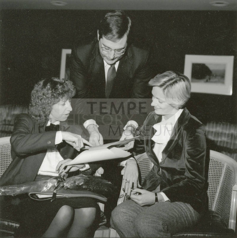 Unidentified picture of two women and one man