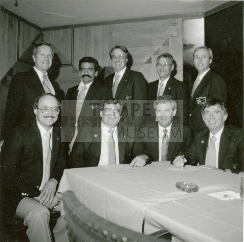 Nine unidentified men with Tempe Diablos insignia