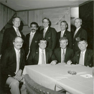 Nine unidentified men with Tempe Diablos insignia