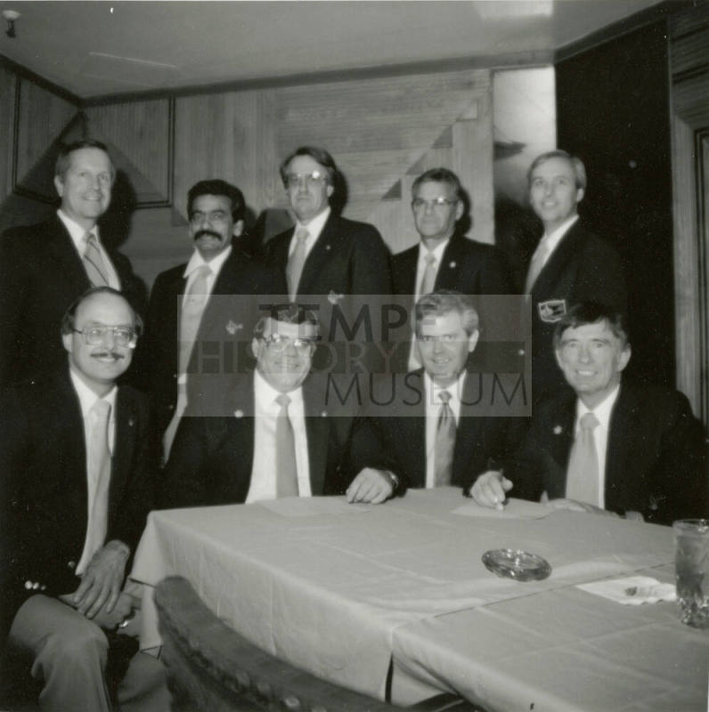 Nine unidentified men with Tempe Diablos insignia