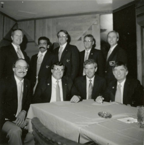 Nine unidentified men with Tempe Diablos insignia