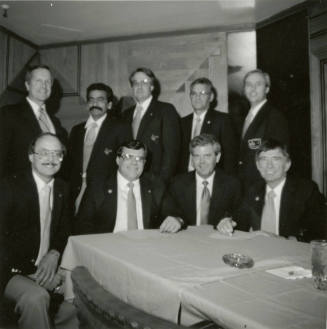 Nine unidentified men with Tempe Diablos insignia