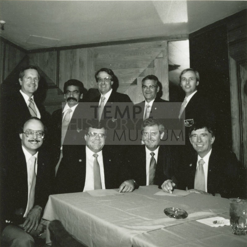 Nine unidentified men with Tempe Diablos insignia