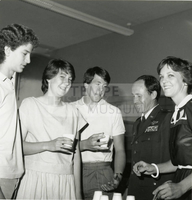 Unidentified Group Gathered Around a Punch Bowl