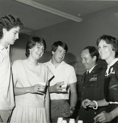 Unidentified Group Gathered Around a Punch Bowl