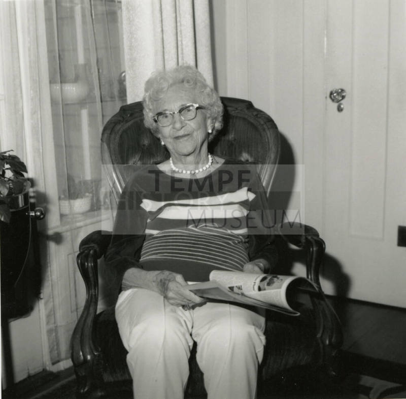 Unidentified Woman Reading Paper - (1 of 2)