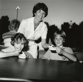 Unidentified Woman with 2 Ice-cream-Eating Children