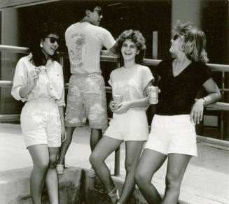 Unidentified Group of Young Adults Take A Break