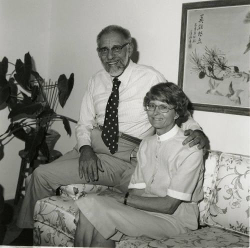 Older man and woman on sofa