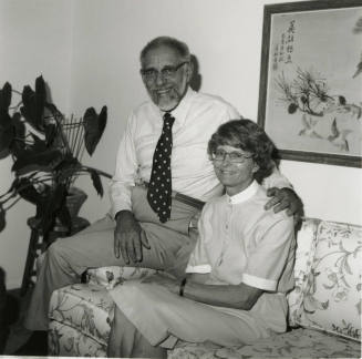 Older man and woman on sofa