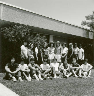 Group of youths outside of a building