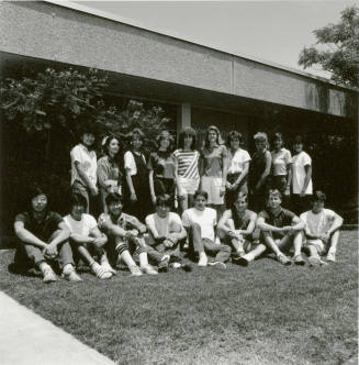 Group of youths outside of a building