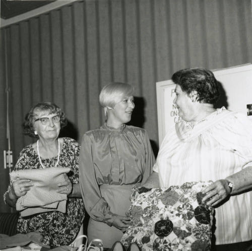 Unidentified Group of 3 Women with Fabric, Shoes, Pillow