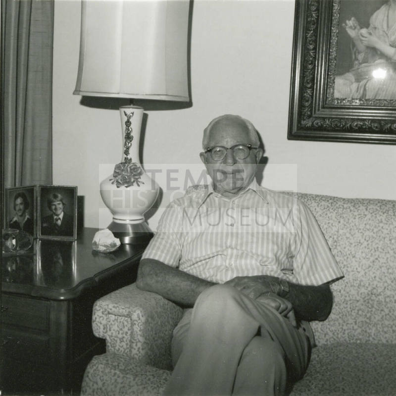 Unidentified Gray Haired Man on Sofa