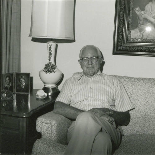Unidentified Gray Haired Man on Sofa
