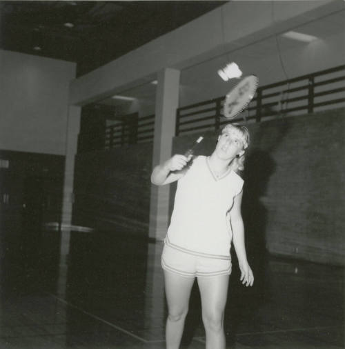 Unidentified Woman Practicing With Racket in Gym - (2 of 3)