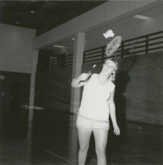 Unidentified Woman Practicing With Racket in Gym - (2 of 3)